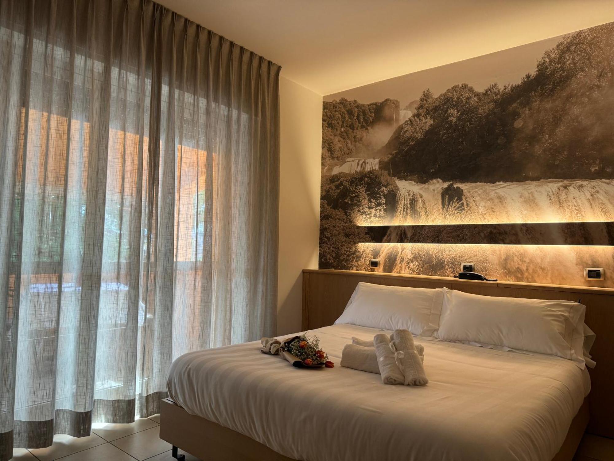 Hotel Cladan Ассизи Экстерьер фото
