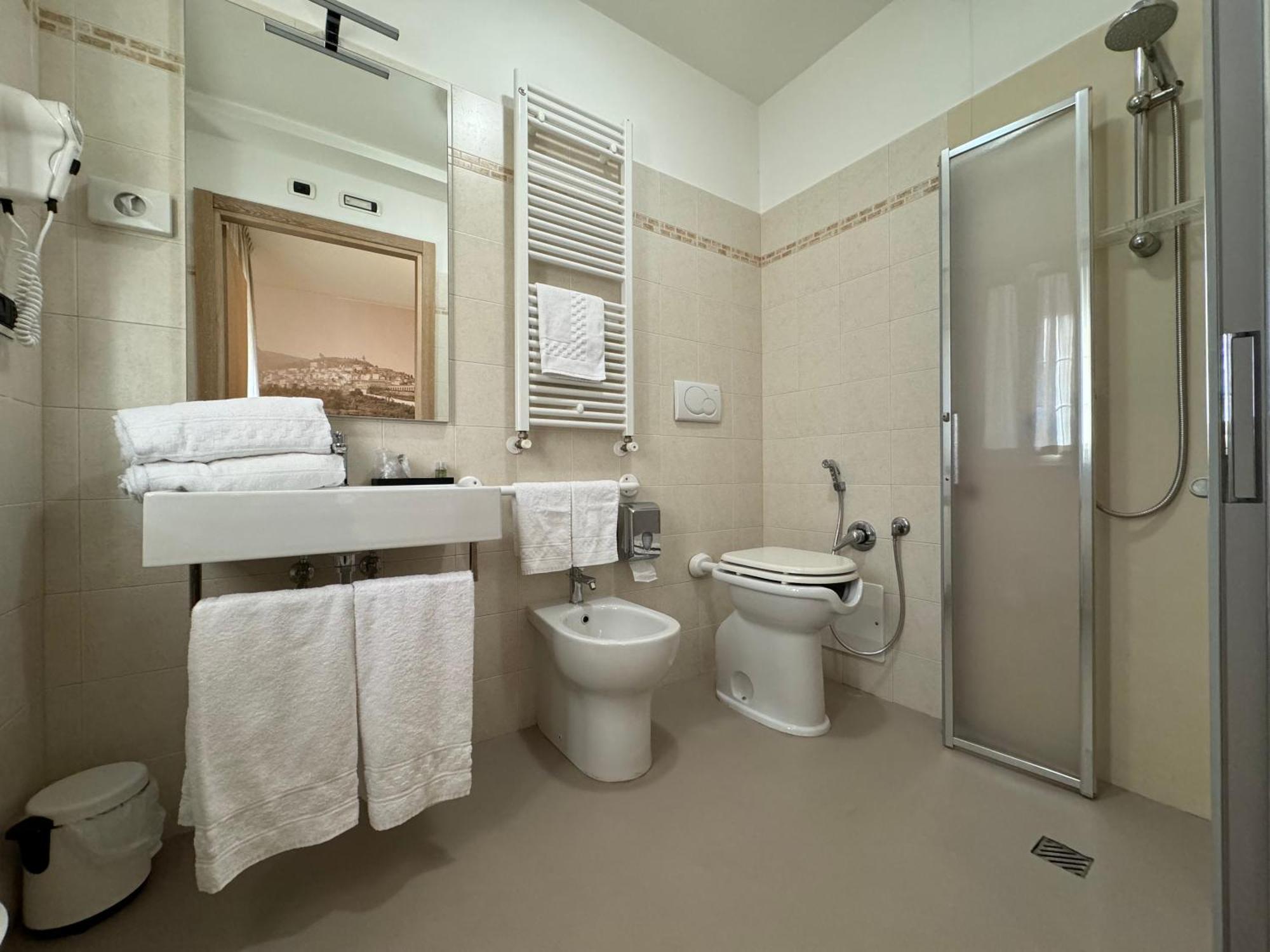 Hotel Cladan Ассизи Экстерьер фото